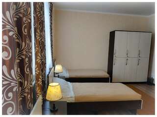 Гостевой дом TwinHouse Karakol Каракол Односпальная кровать в общем номере-2