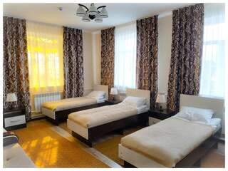 Гостевой дом TwinHouse Karakol Каракол Односпальная кровать в общем номере-3